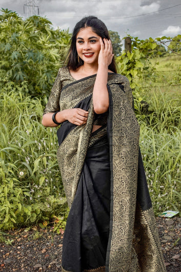 Black Semi Silk Saree Weaved With Golden Zari With Attached Heavy Brocade Blouse