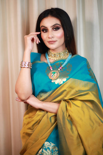 Rama With Light Yellow Semi Silk Saree Weaved With Golden Zari With Attached Heavy Brocade Blouse