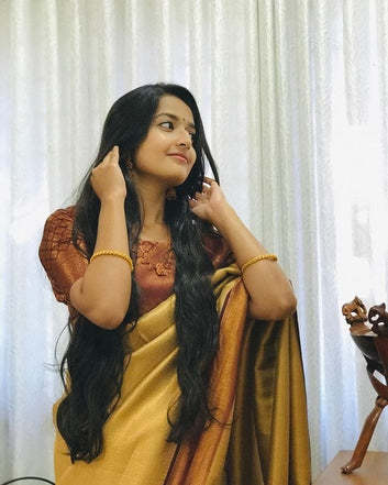 Symmetrical Yellow Pure Soft Silk Saree With Engrossing Blouse Piece