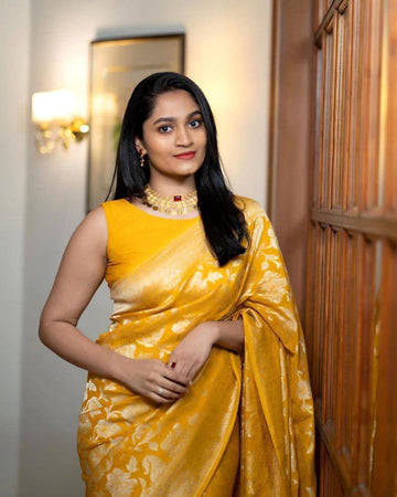 Snazzy Yellow Pure Soft Silk Saree With Confounding Blouse Piece
