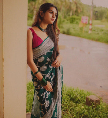 Quintessential Dark Green Soft Banarasi Silk Saree With Magnific Blouse Piece