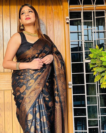 Symmetrical Black Pure Soft Silk Saree With Engrossing Heavy Brocade Blouse Piece