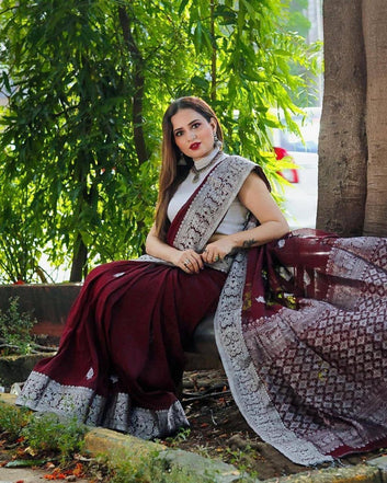 Symmetrical Maoon Pure Soft Silk Saree With Engrossing Blouse Piece