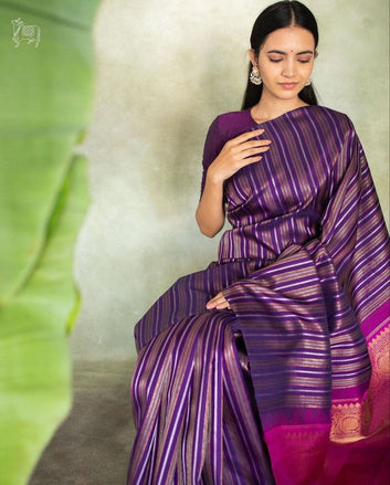 Purple Semi Silk Saree Weaved With Golden & Copper Zari With Attached Heavy Brocade Blouse