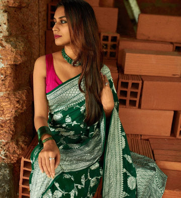 Quintessential Dark Green Soft Banarasi Silk Saree With Magnific Blouse Piece