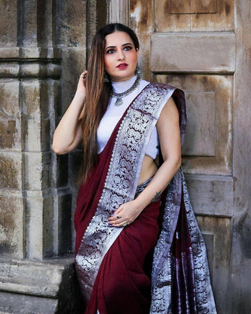 Symmetrical Maoon Pure Soft Silk Saree With Engrossing Blouse Piece